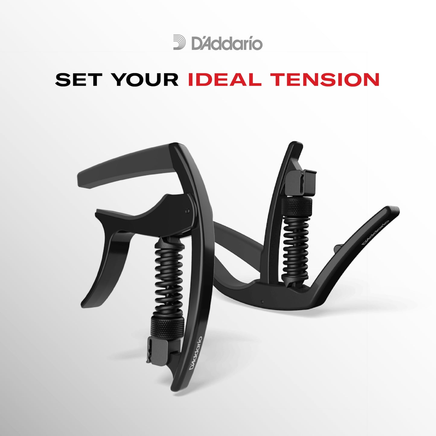 Black D'Addario Tri-Action capo for ukuleles with micrometer tension adjustment.