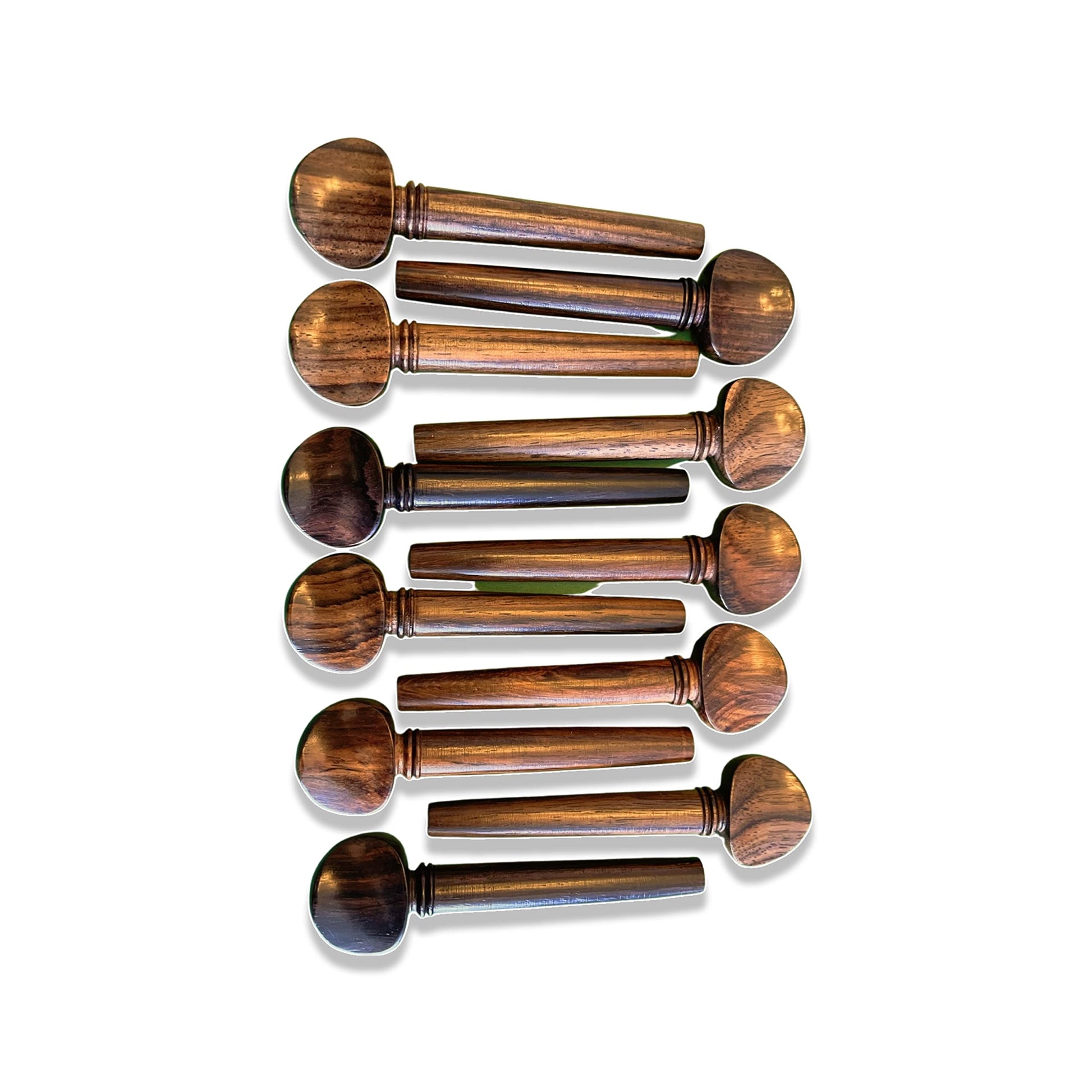 Set of 11 handcrafted rosewood pegs for oud and violin, each 3 inches long.