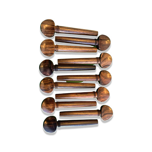 Set of 11 handcrafted rosewood pegs for oud and violin, each 3 inches long.